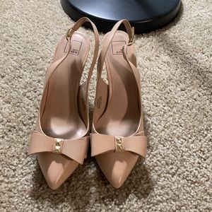 Leather nude heels with a lovely bow